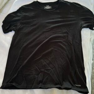 Calvin Klein all black Tee Shirt. Make me an offer